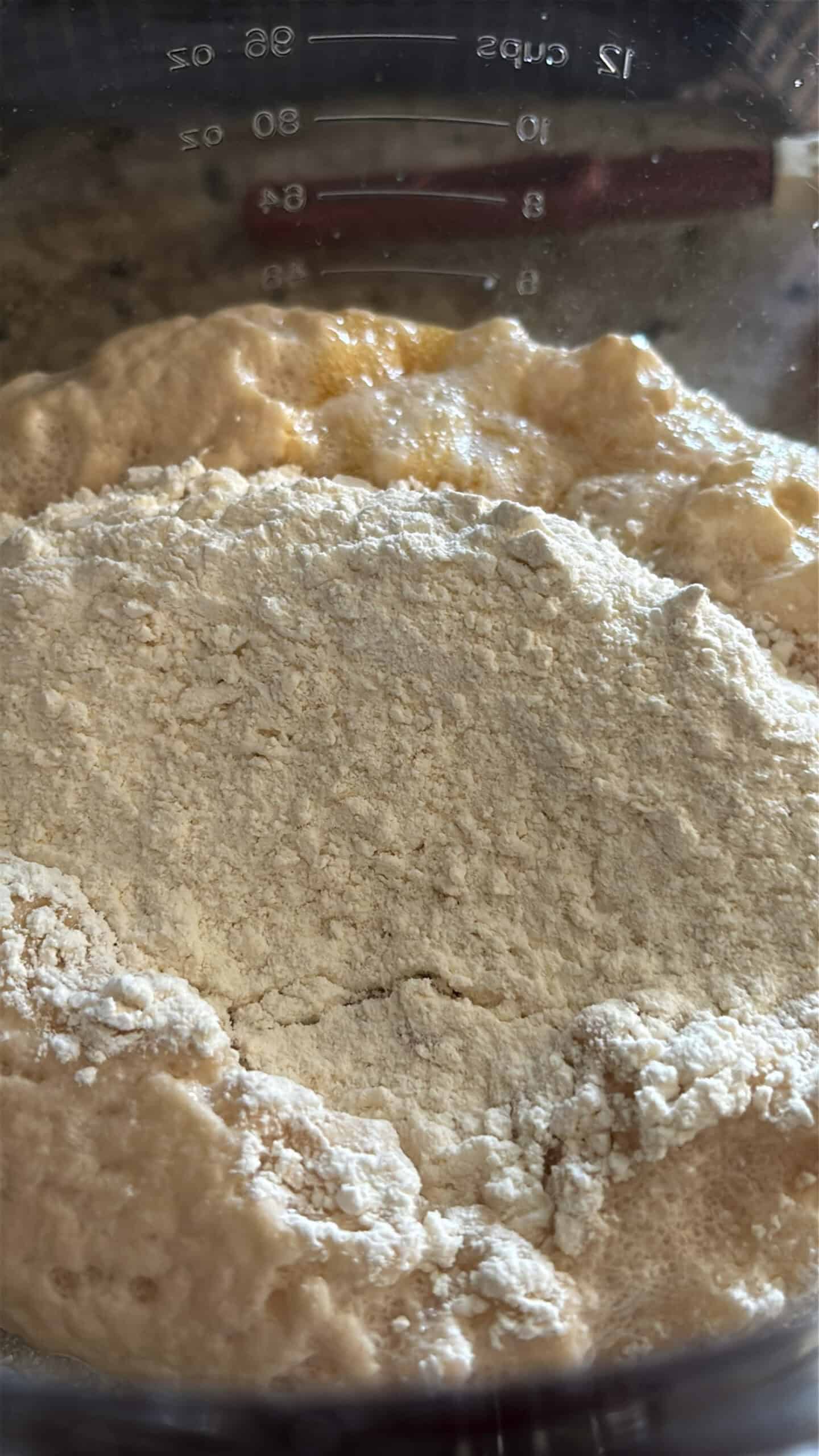 dry ingredients added to wet for honey butter rolls.