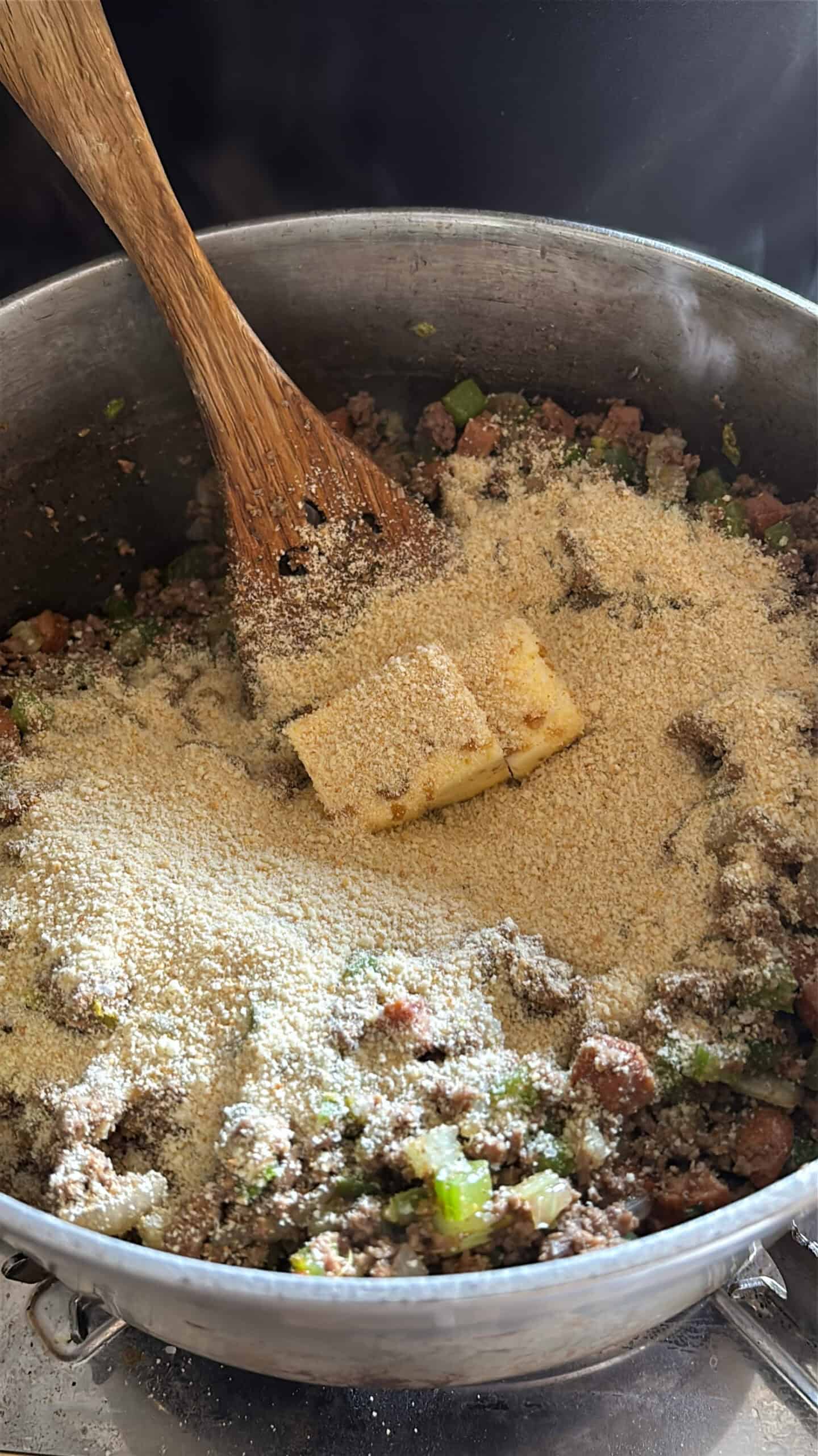 Breadcrumbs and seasonings add to bell pepper stuffing.