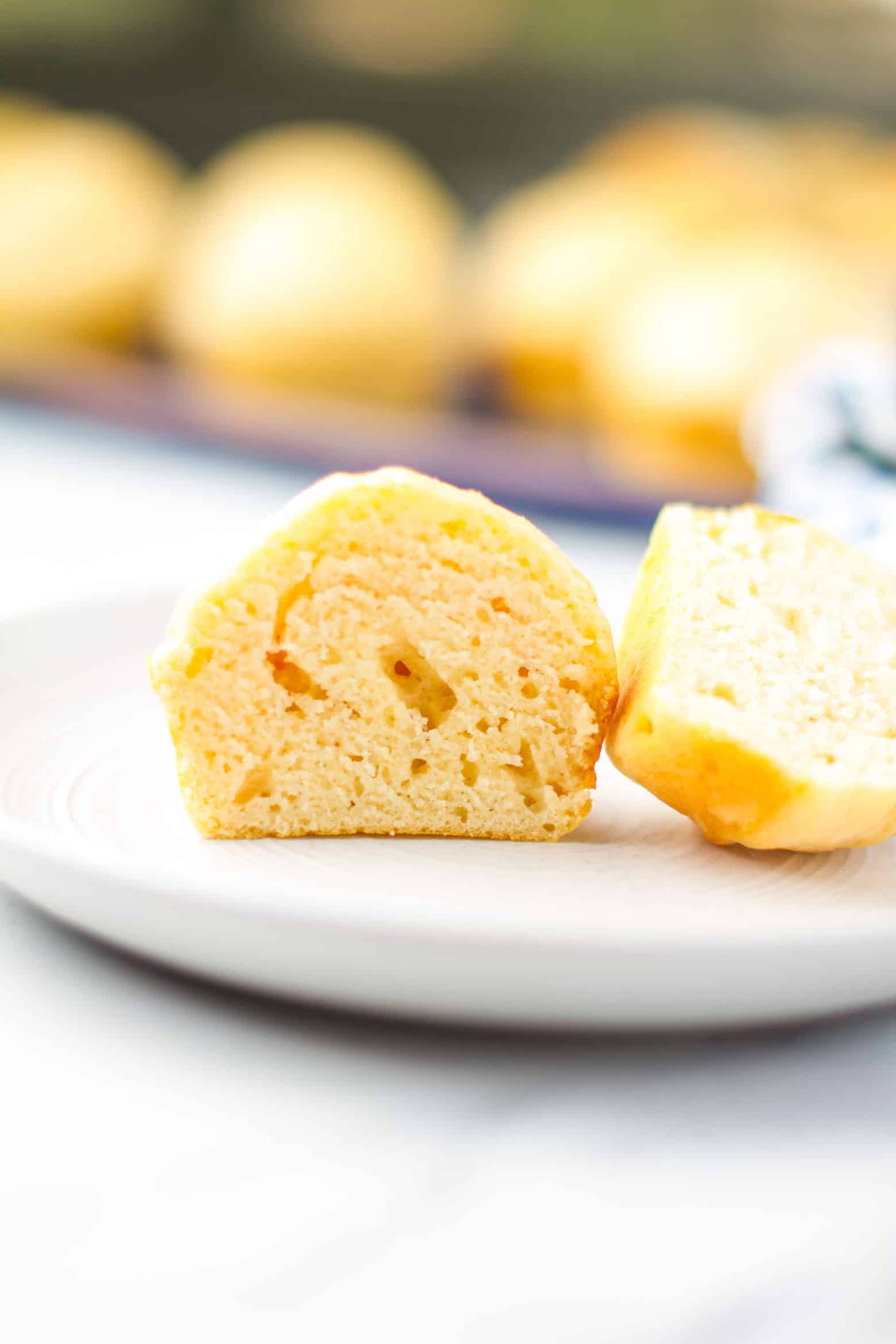 No yeast roll cut in half on a plate.
