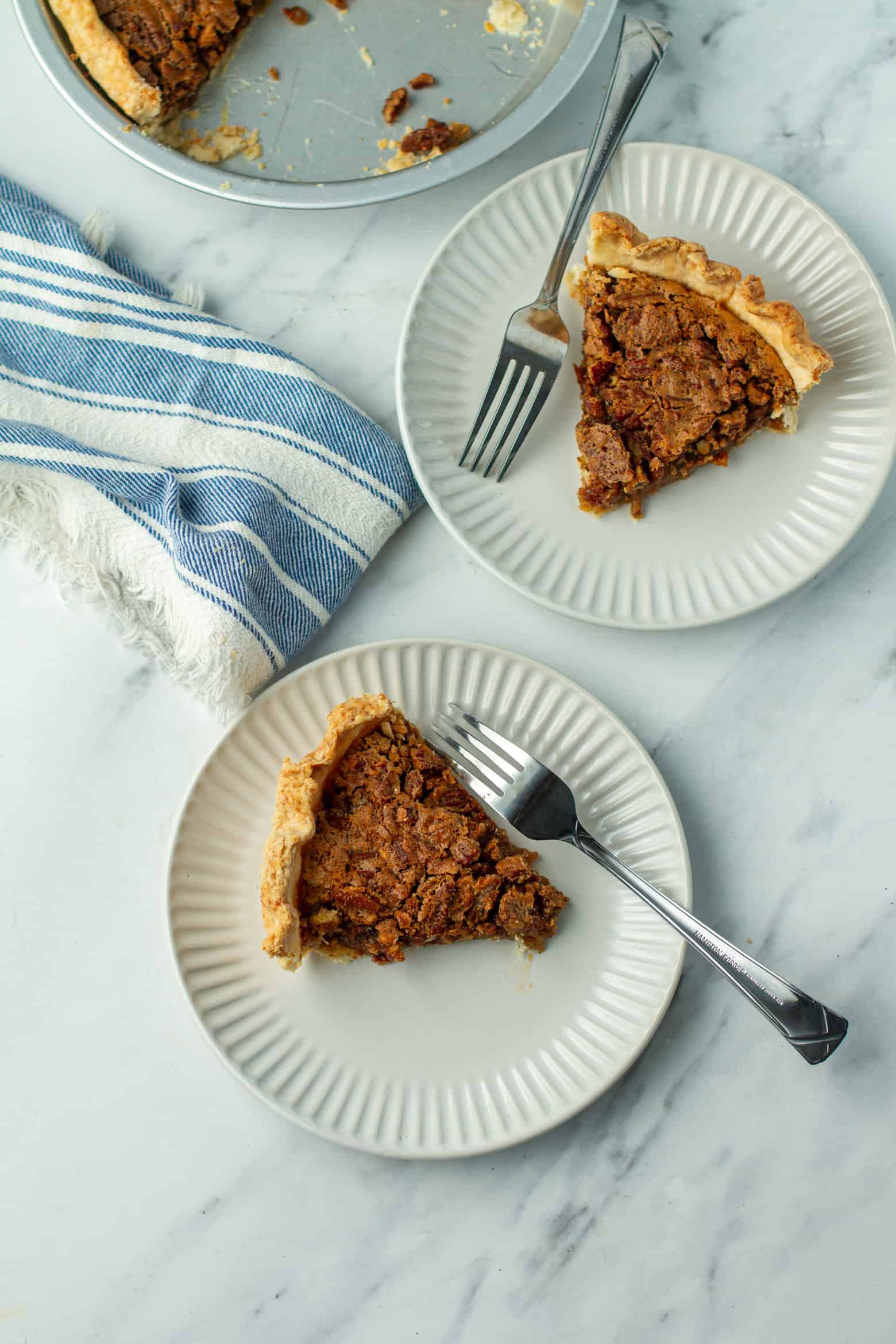 Slices of Pecan Pie on a plates.