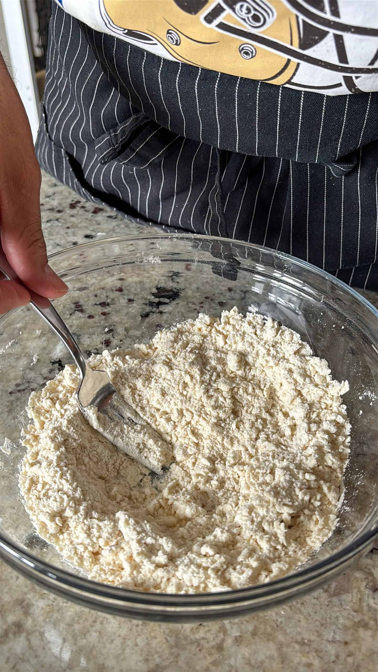 Dry ingredients for pie crust in a bowl.