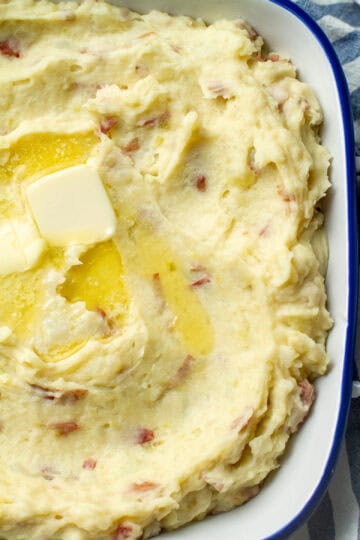 Red skin mashed potatoes in a baking dish.