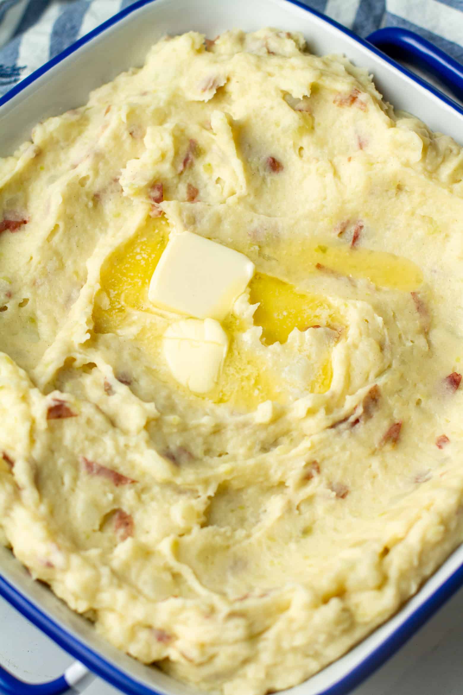 Red skin mashed potatoes in a baking dish.