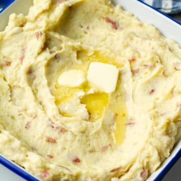 Red skin mashed potatoes in a baking dish.
