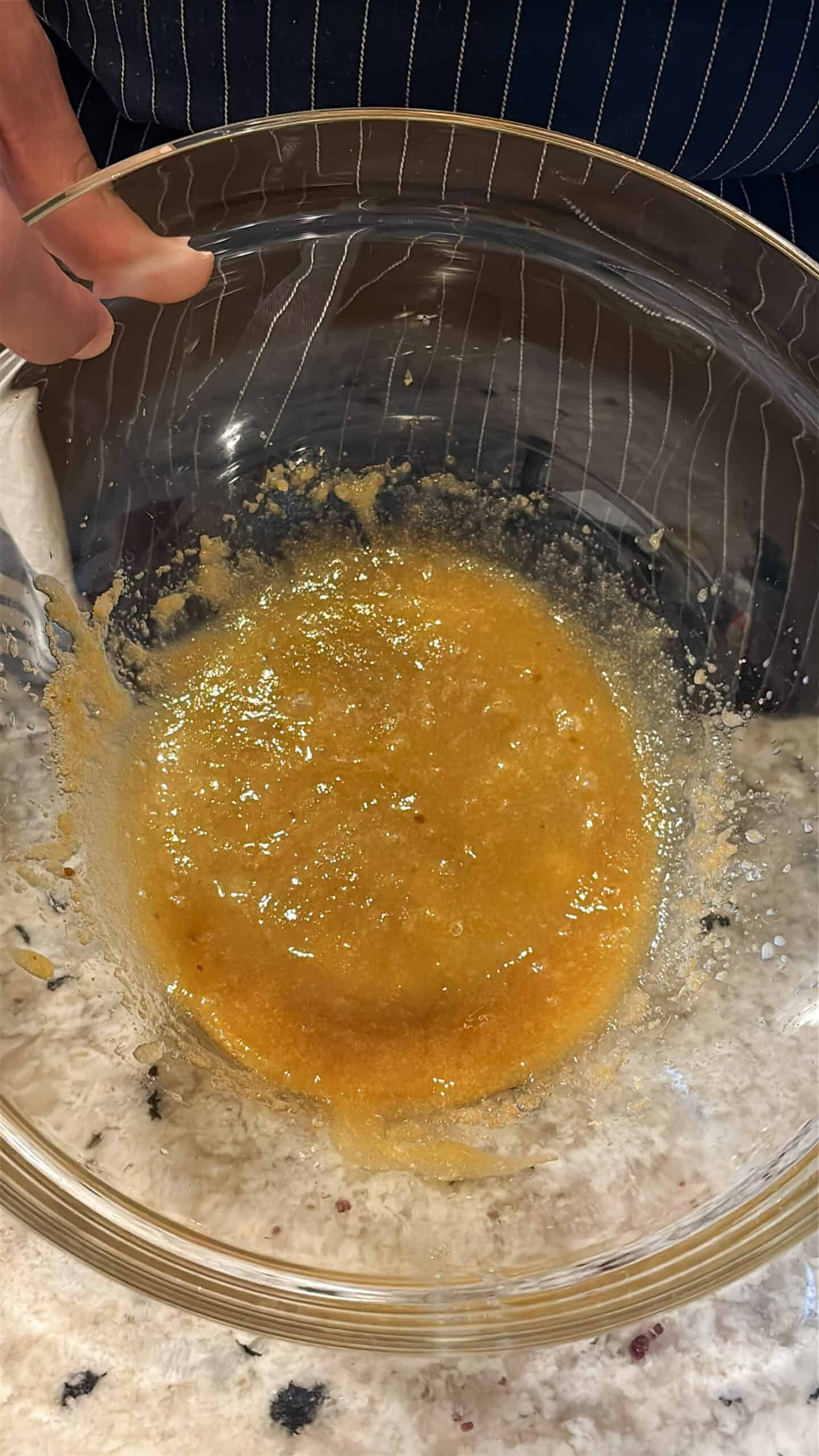 Butter and sugar creamed in a bowl.