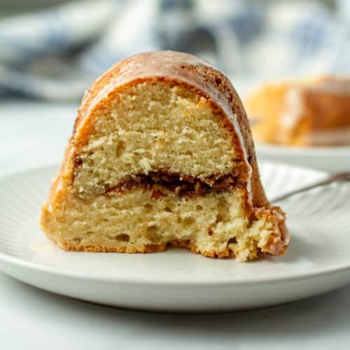 Slice of sock it to me cake on a plate.