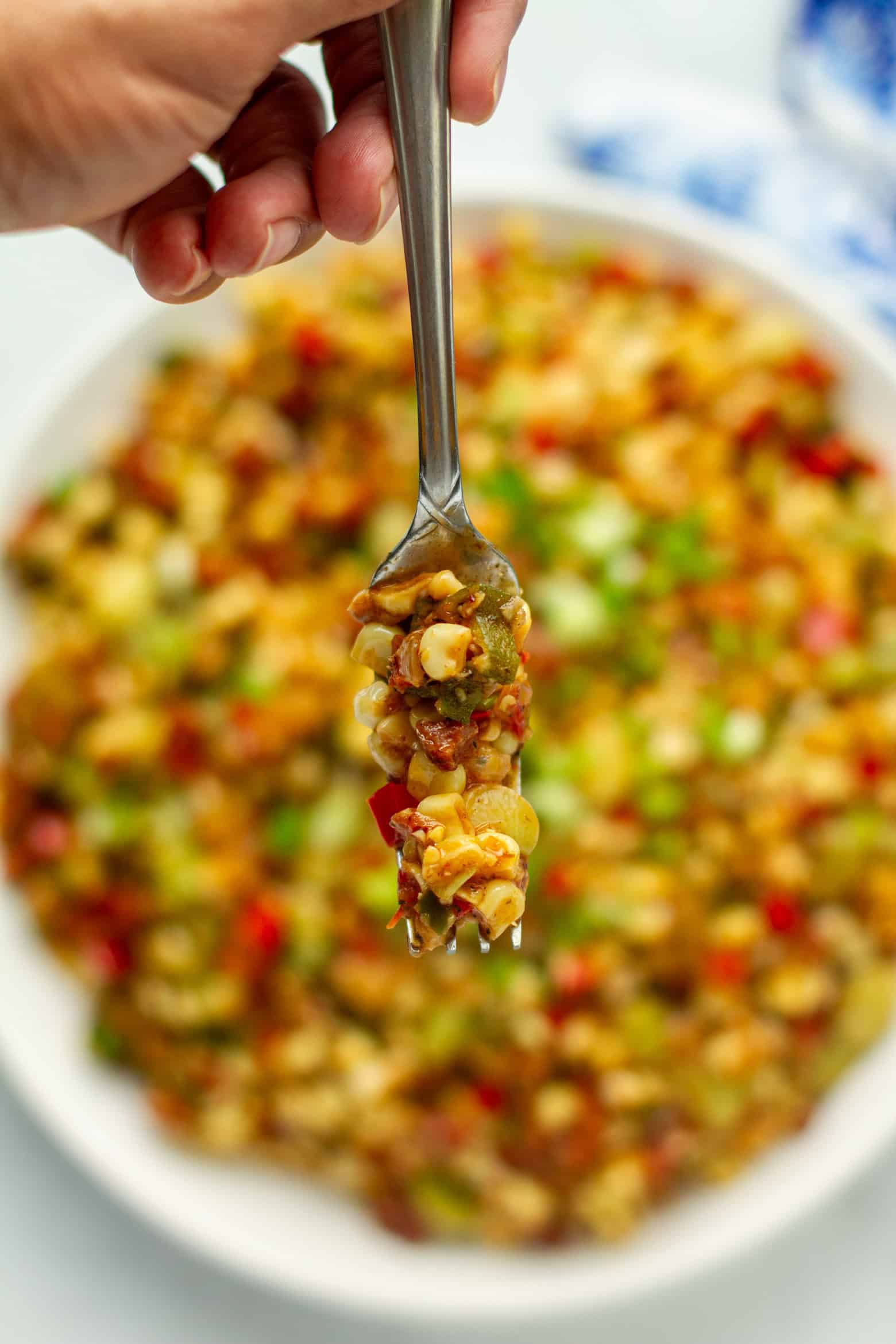 Succotash on a fork.