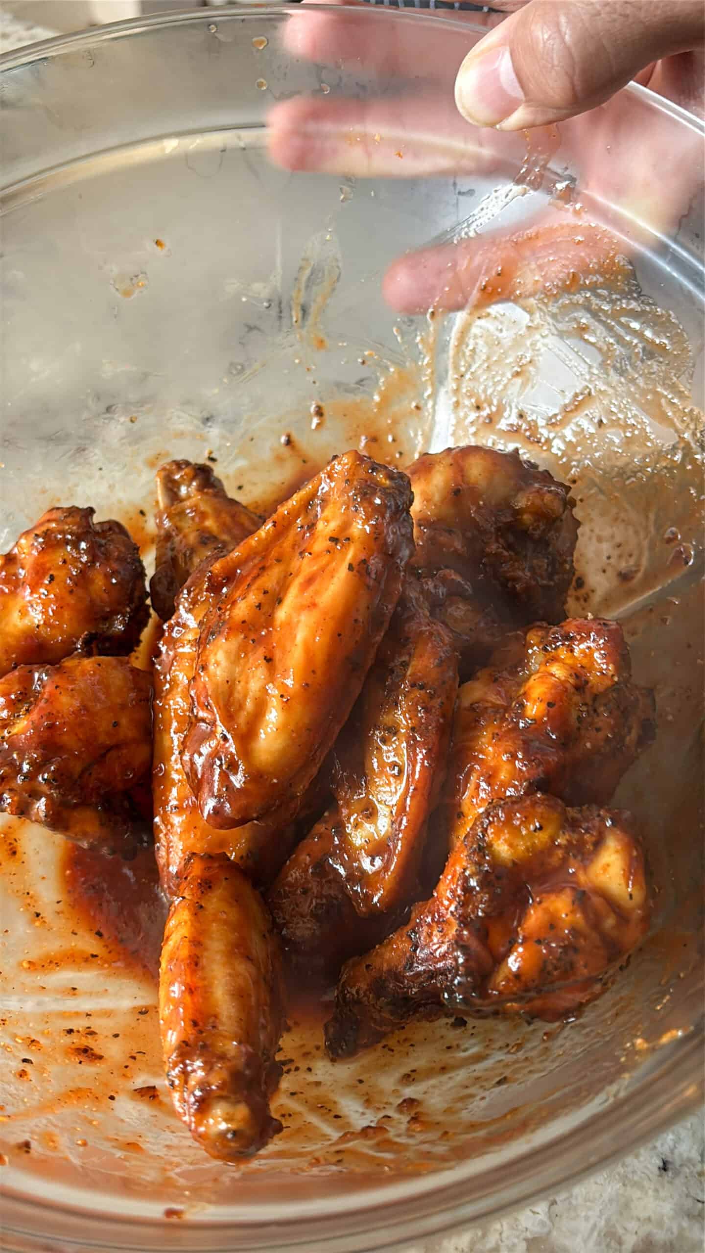 Cooked chicken wings tossed in bbq sauce.