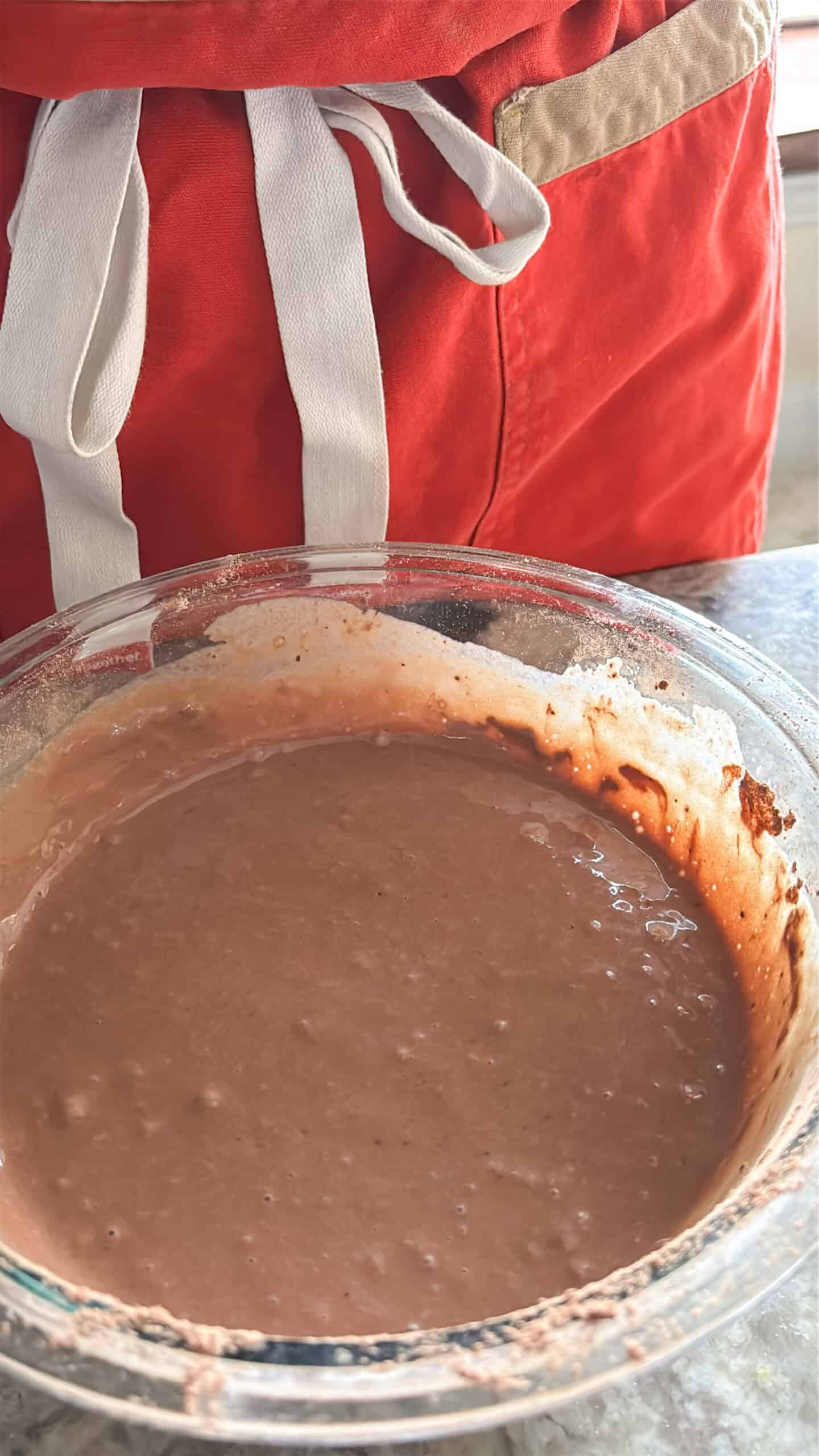 Chocolate crepe batter in a bowl.