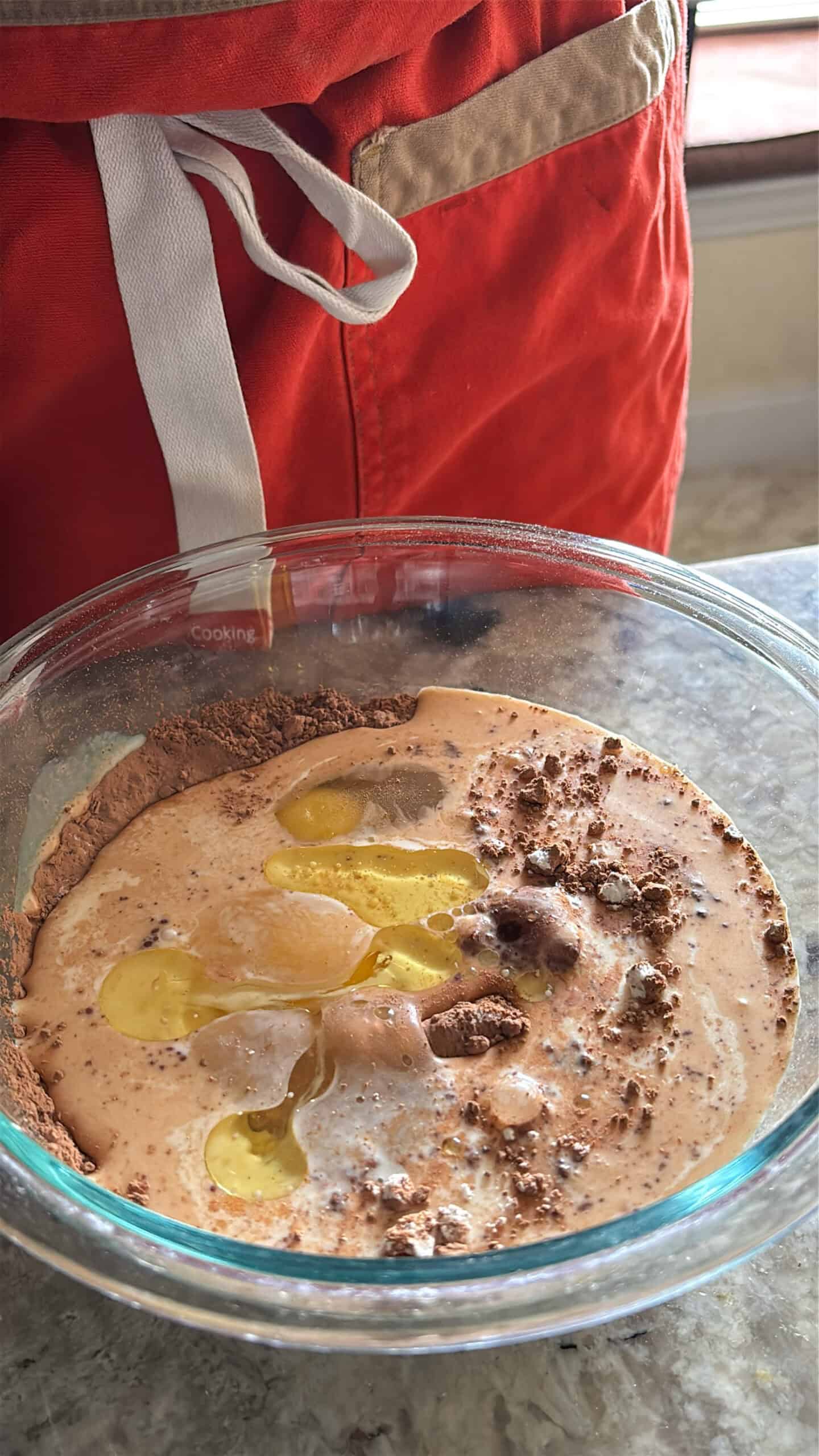 Chocolate crepe ingredients in a bowl unmixed.