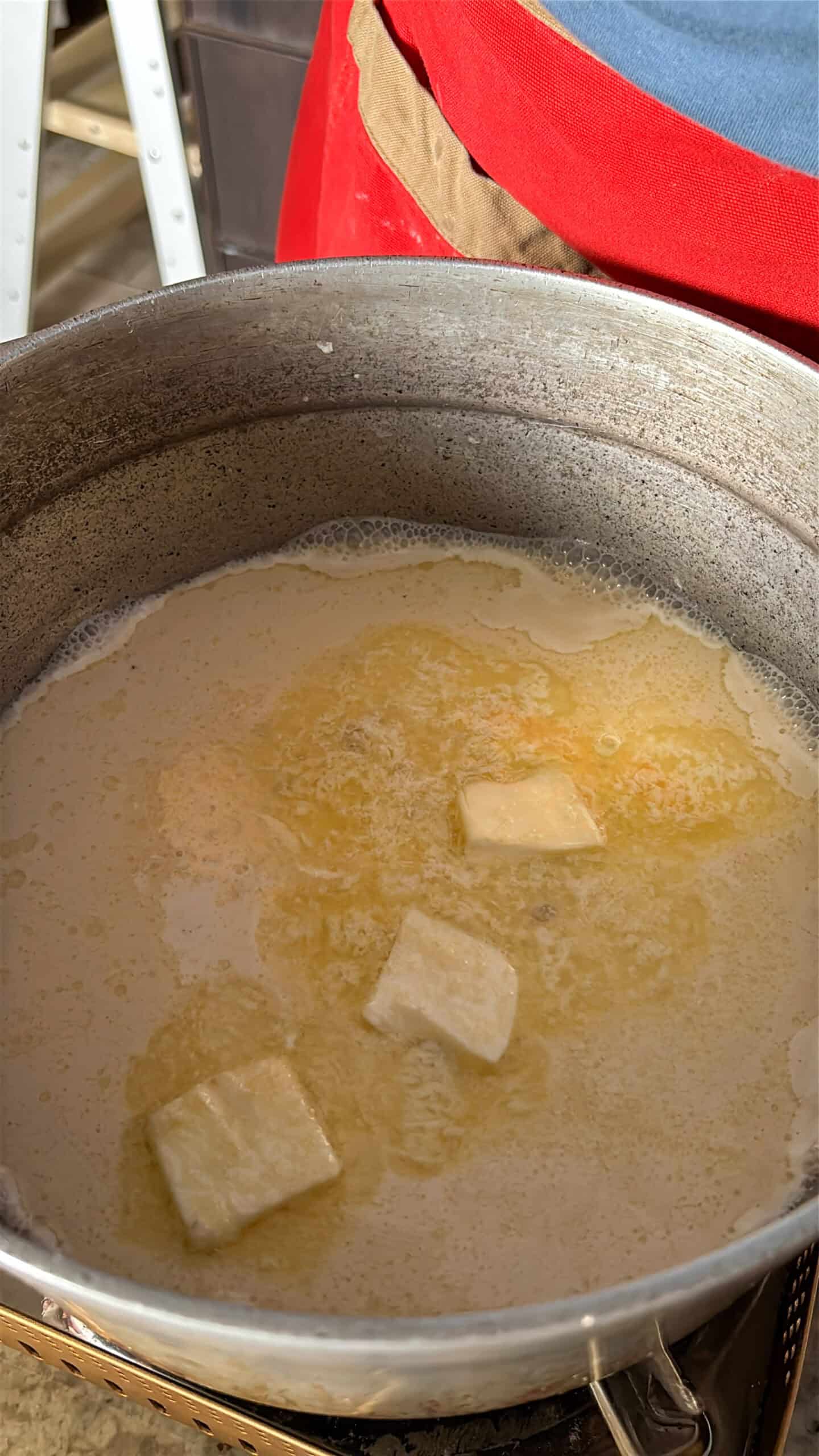 Butter, sugar, milk, and salt in a pot.