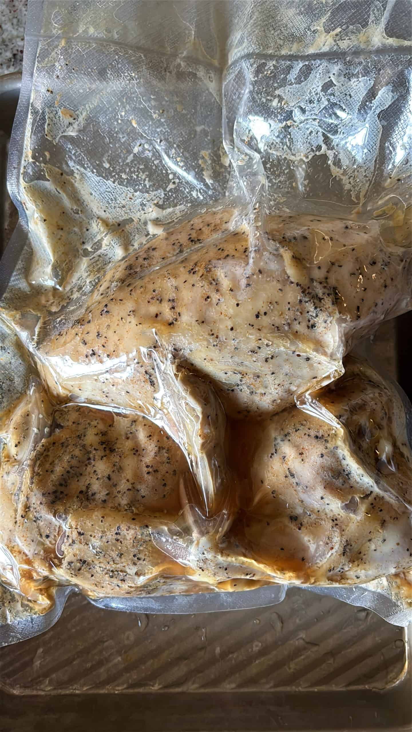 Cooked chicken in a vacuum sealed bag.