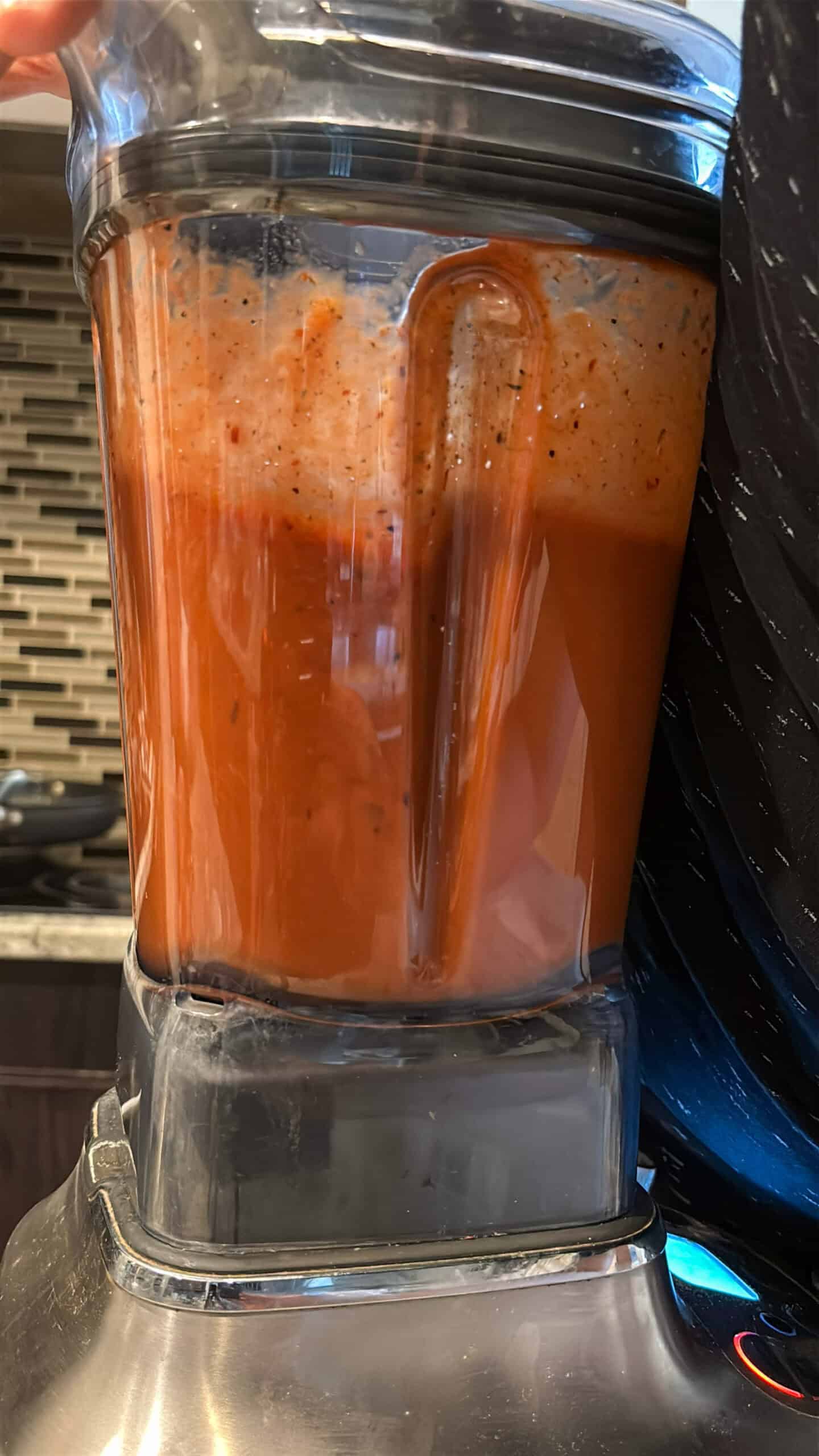 Creole sauce blending in a blender.