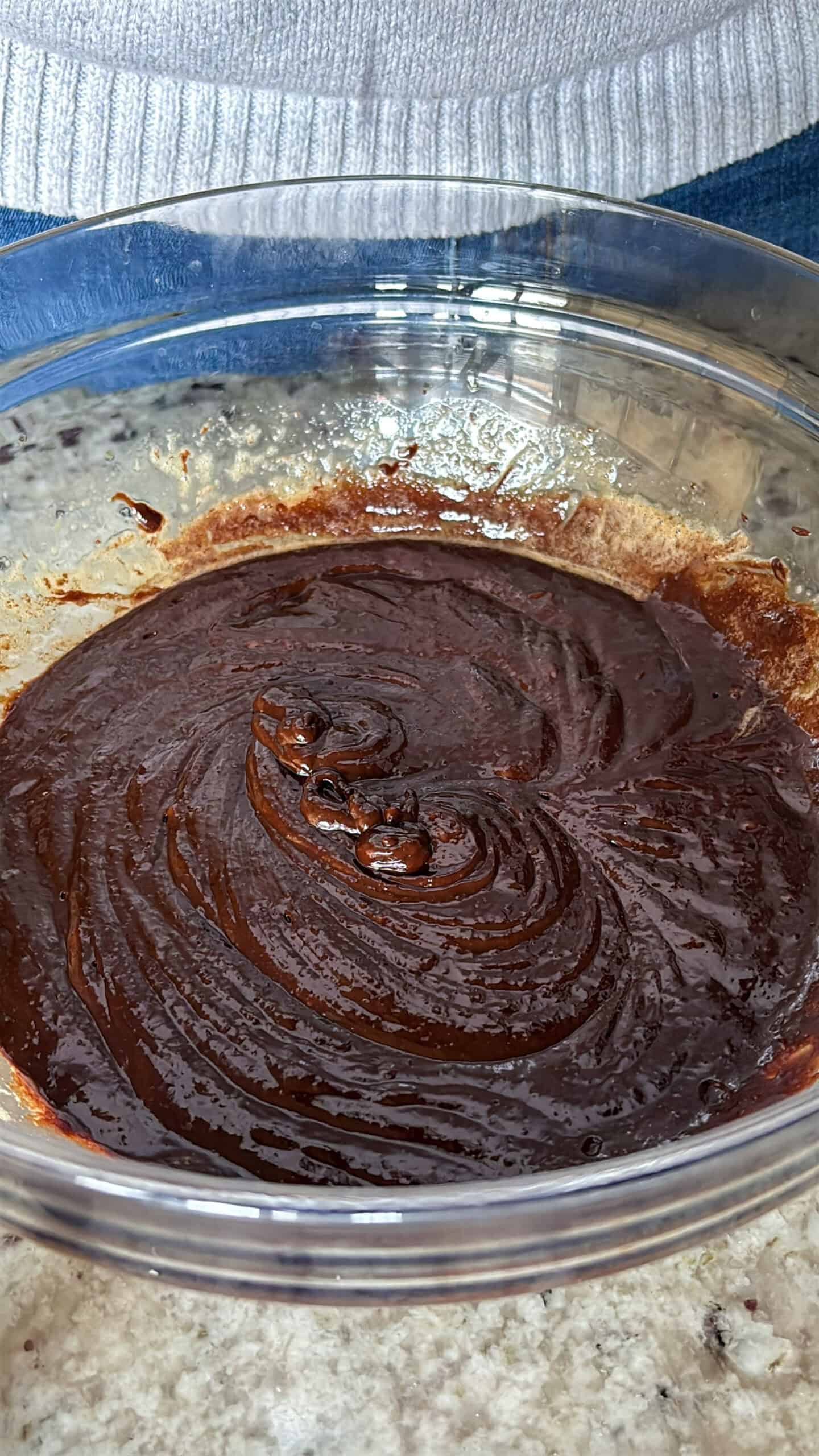 Add melted chocolate and vanilla with eggs.