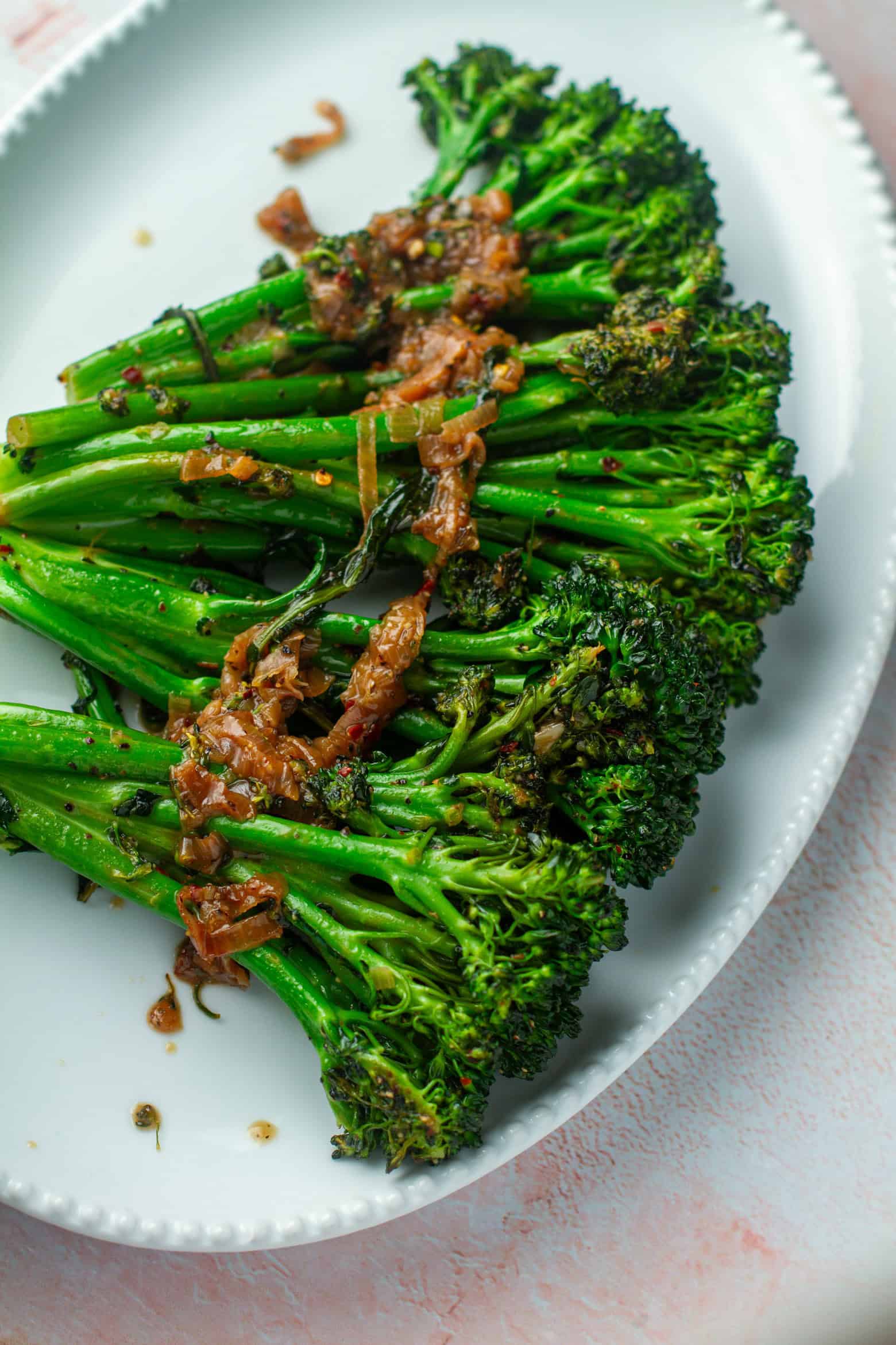 Sauteed broccolini on a platter.