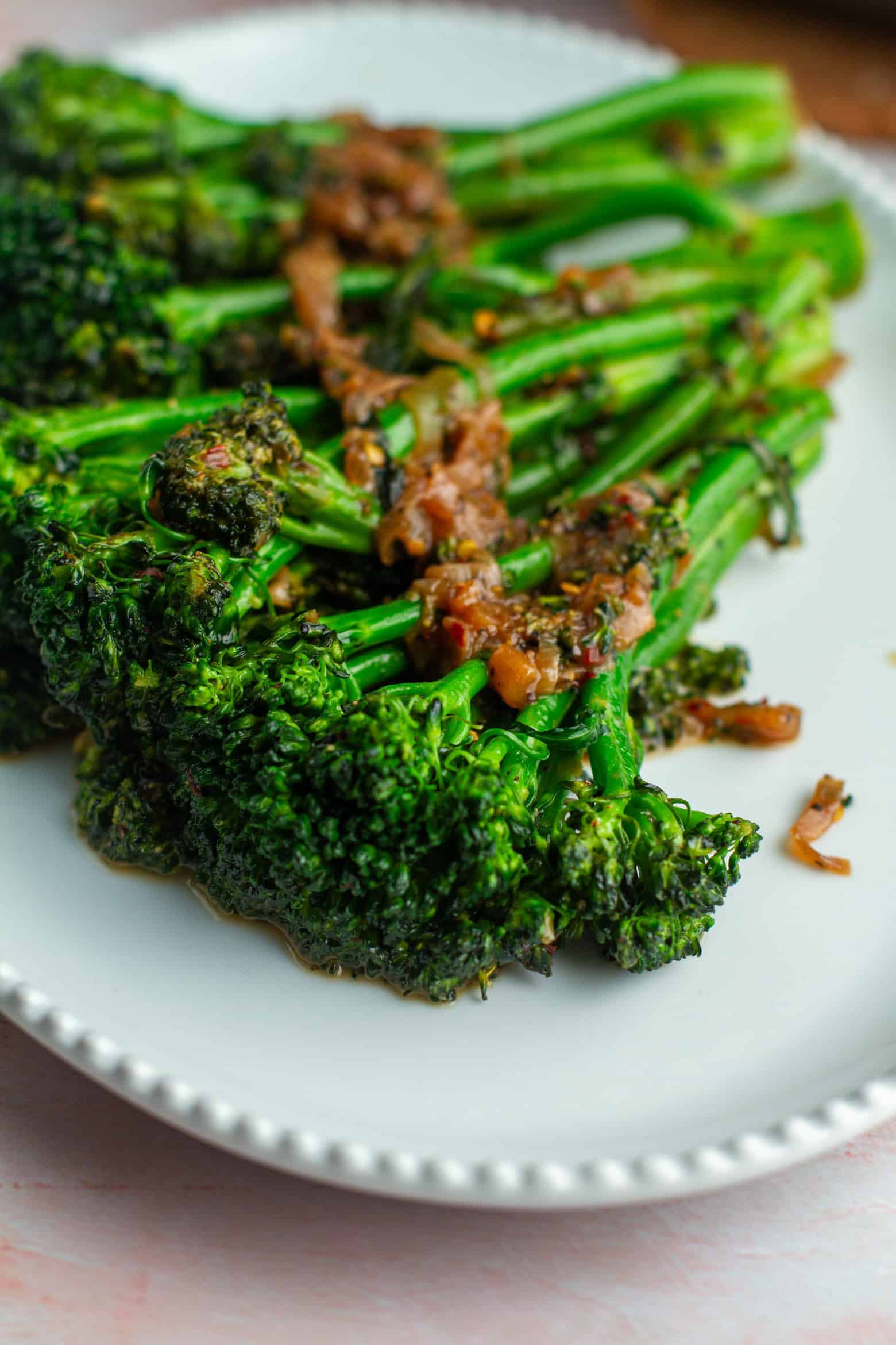 Sauteed broccolini on a platter.